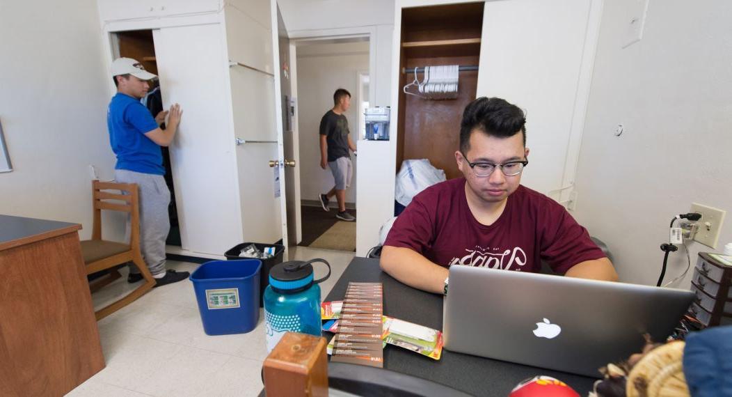 Students in dorm room